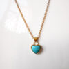 Alt: collar turquesa y oro 18k